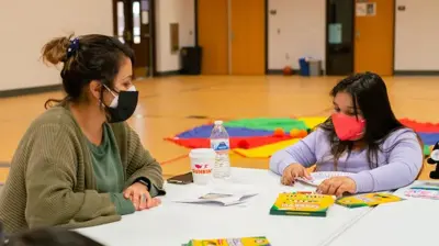 People at a table Photo